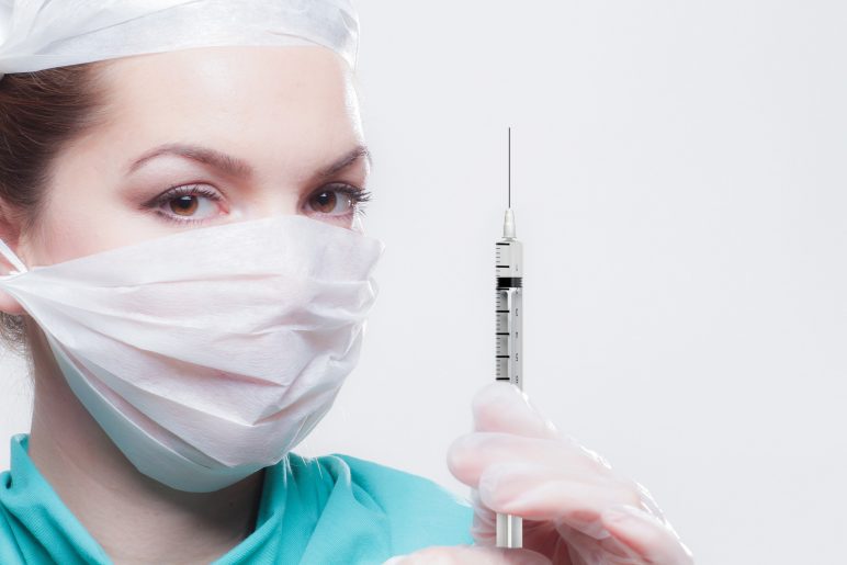 a nurse with a syringe